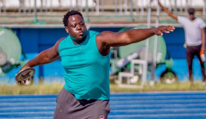 Akeem Stewart competes in the discus event at the NAAA Development Meet at the Dwight Yorke Stadium in Bacolet. - DAVID REID