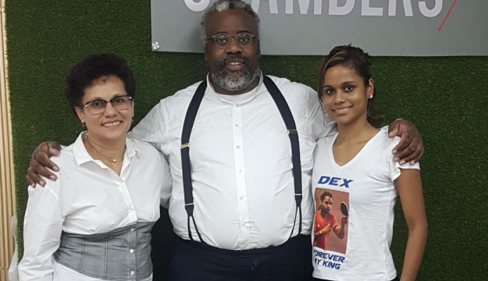 IT’S OVER!: Jeromaine St Louis, left, and Rheann Chung, right, celebrate with their lawyer Matthew Gayle at New City Chambers in Port of Spain, yesterday, following completion of the Dexter St Louis/Rheann Chung vs Trinidad and Tobago Table Tennis Association (TTTTA) case, at the Hall of Justice. The parties agreed on a settlement.   --Photo: KWAME LAURENCE