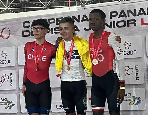 TT rider Jadian Neaves, right, with his bronze medal at the Jr Pan Am Championships in Peru. - (Image obtained at newsday.co.tt)
