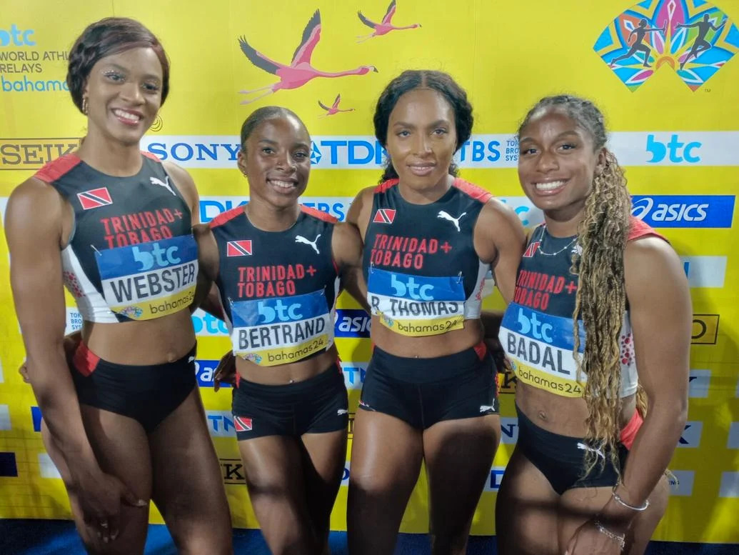 PARIS TICKET BOOKED: Reese Webster, left, Leah Bertrand, Reyare Thomas and Taejha Badal celebrate Trinidad and Tobago’s qualification for the Olympic Games at the World Athletics Relays in Nassau, Bahamas, late on Sunday. The T&T quartet clocked 43.54 seconds for second spot in heat two in the second round of Olympic qualifying. —Photo: BRENT STUBBS (Image obtained at trinidadexpress.com)