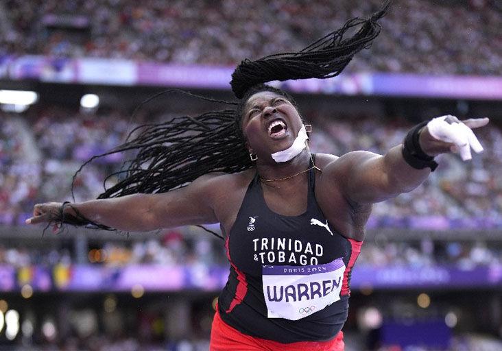 ALL-OUT EFFORT: Trinidad And Tobago’s Portious Warren competes during the women’s shot put qualification round at the 2024 Summer Olympics, in Saint-Denis, France, last Thursday.  Photo: AP (Image obtained at trinidadexpress.com)